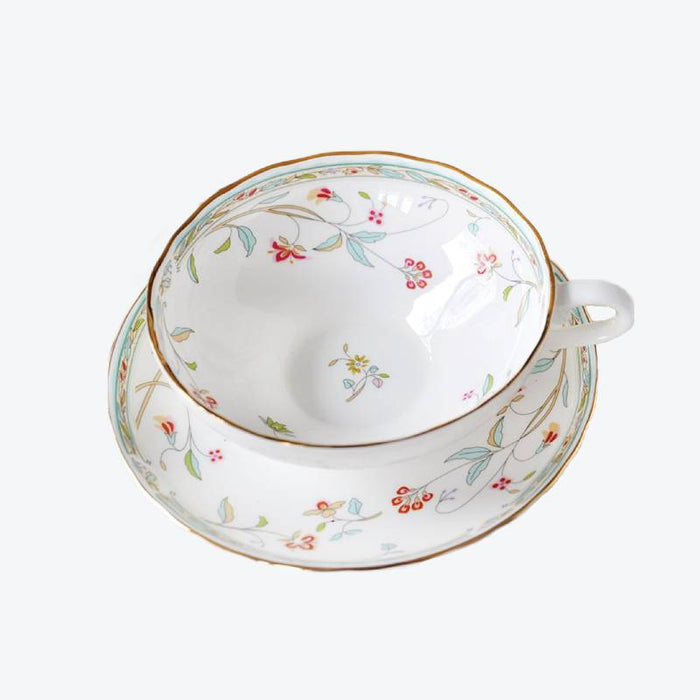 Gold-Rimmed Ceramic Tea Cup And Saucer Set